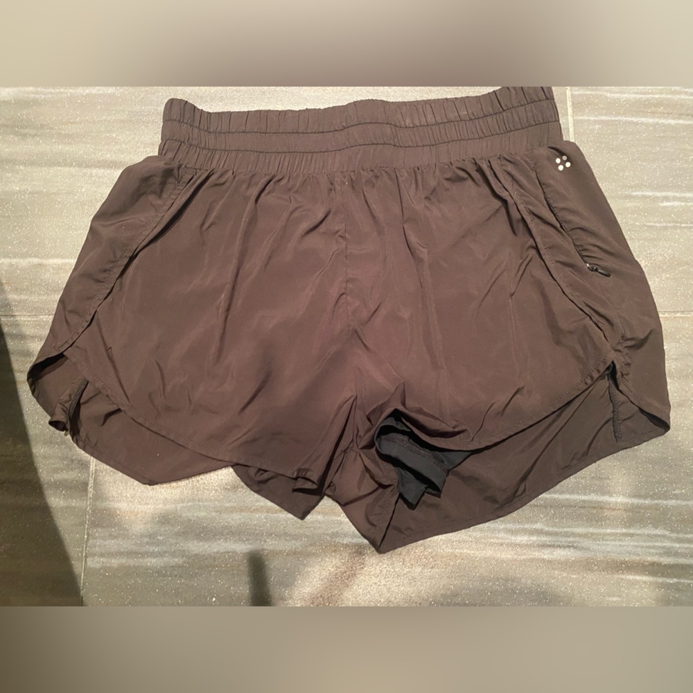 Black acts running shorts